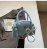 Bolsa Almofada para Mulheres 2026 Nova Super Popular Bolsa de Mão Pequena Bolsa Tote Bolsa de Ombro Único Transversal Doce Laço Pequena Bolsa