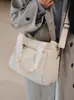 Verano 2026 Nuevo Bolso de Mano Casual de Gran Capacidad para Mujer Bolso de Hombro Versátil Simple de Tela de Nailon Bolso Cruzado
