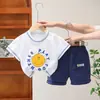 Nuevo traje de verano para niños de dos colores con expresión, cuello redondo, manga corta, comercio exterior, bebé niño, expresión, manga corta, dos piezas, venta directa