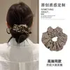 Goma para el pelo estilo coreano retro con estampado de leopardo para mujer, accesorio para el pelo para recogido en moño, Otoño Invierno 2026, nuevo, sensación de alta gama