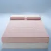 Sábana bajera acolchada impermeable grado A protector de colchón a prueba de orina para dormitorio de estudiante juego de tres piezas engrosado de color sólido 1.8m 1.5m