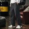 Calça casual masculina nova de outono, calça esportiva de corte solto, calça de trabalho, calça masculina da moda de perna reta solta, pequeno design curvo