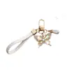Llavero creativo estilo coreano de mariposa, colgante para coche, accesorio de regalo versátil y elegante para parejas