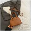 Bolsa Satchel de Nicho com Laço para Mulheres 2025 Nova Moda Primavera e Verão Bolsa Concha com Textura Bolsa Transversal Versátil