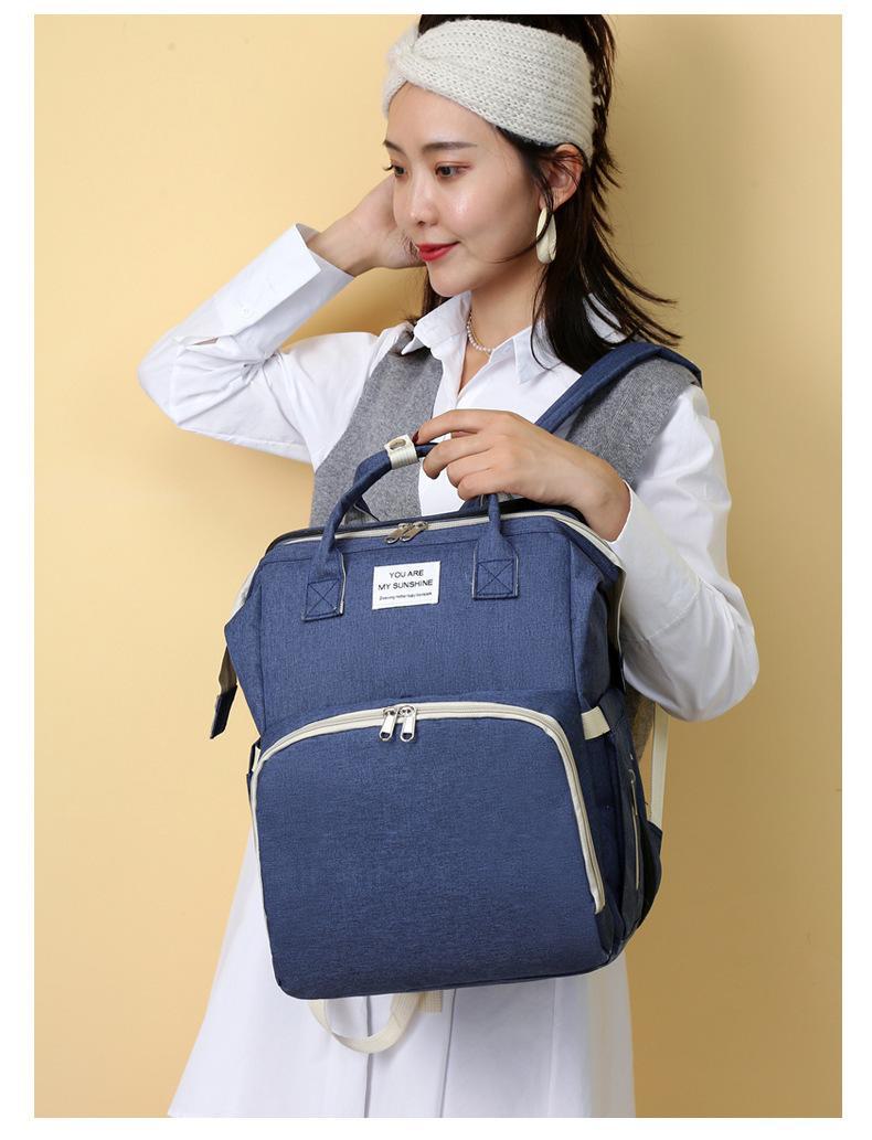 新款便携式折叠婴儿床19.jpg