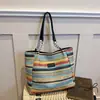 Bolsa de mano de gran capacidad, bolsa de paja para vacaciones, nueva bolsa de hombro de nicho para el día a día, moderna bolsa de playa de verano para mujer