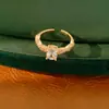 Anillo abierto ovalado de zirconita chapado en oro real de 18 quilates, estilo de nicho de alta gama, joyería versátil y elegante de lujo ligero