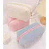 1 pieza Bolsa de almacenamiento de cosméticos de piel sintética sólida para mujer con cremallera Organizador de maquillaje Bolso Estuche de papelería para lápices Estuche de viaje para maquillaje Artículos de tocador