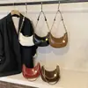Bolso de Axila con Textura de Nicho Estilo Francés para Mujer 2025 Nuevo Bolso Simple de Media Luna Bolso de Hombro con Cadena de Moda para Viajar