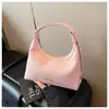 Bolsa de Ombro Transfronteiriça Nova de Primeira Camada Design de Nicho Fashionável Versátil Bolsa de Axila Bolsa de Ombro Único Transversal de Alta Qualidade