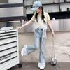 Pantalones acampanados de mezclilla de primavera y verano para niñas 2025 Nueva moda Pantalones elegantes de encaje de estilo coreano para niñas
