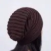 Gorro de punto liso para mujer de otoño e invierno, cálido y elástico, gorro tipo jersey para mujer estilo europeo y americano, gorro de punto transfronterizo al por mayor