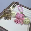 Popular Llavero Colgante Pastel de la Fortuna Princesa Dorada Colgante de Lista Dorada Bolso Regalo de Paz y Alegría