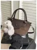 Bolso de mano de alta gama de moda, bolso cruzado, bolso de mujer más vendido, bolso de hombro simple casual, bolso cubo de alta gama