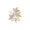 Broche de hojas de perla con microincrustaciones de cobre de alta calidad, simple, con realce de circonita, hebilla antiluz, venta al por mayor de fábrica de una generación