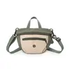 Atacado transfronteiriço nova bolsa de mão coreana de nicho com cor contrastante bolsa de sela de lona bolsa de ombro único transversal bolsa de celular para atividades ao ar livre