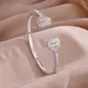 RAKOL Moda Luxo Leve Cobre Incrustado Zircônia Trevo de Quatro Folhas Aberto Ajustável Pulseira Feminina Nicho Toque de Alto Padrão Joia de Mão