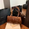 Bolso de hombro texturizado para axila, nuevo de principios de otoño 2026, moderno, a la moda, simple, diseño nicho coreano, bolso de hombro estilo Hong Kong
