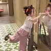 Conjunto de verano nuevo estilo coreano para niñas 2026, camiseta linda para bebés, top versátil, pantalones de pierna ancha con dobladillo de volantes a la moda