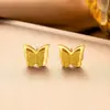 Aretes de acero de titanio aretes de alta gama nicho temperamento Perla aretes de borla de flor encantadores joyería versátil para mujer venta al por mayor