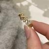 Anillo de circonita de estilo coreano con diseño de nicho para mujer, elegante, de alta gama, delicado y abierto, estilo frío.