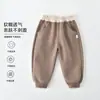 Suministro directo de fábrica de pantalones deportivos de dibujos animados de Clase A para niños y niñas, pantalones holgados de otoño, pantalones deportivos casuales suaves para niños pequeños