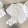 Calcetines finos de plata para muslos de primavera, calcetines largos de seda brillante con lazo, calcetines grises europeos para mujer