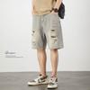 Pantalones cortos de mezclilla vintage para hombre, holgados, talla grande, de cinco puntos, raspados, rotos, estilo mendigo, casual americano, marca de moda, pantalones de verano de media longitud