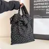 Bolsa de Lona Tipo Cubo Floral Nueva Primavera y Verano Estilo Coreano para Mujer Bolso de Hombro Simple de Gran Capacidad Bolsa Cruzada de Compras
