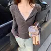 Una generación de resorte de pelo y encaje de lijado de otoño con costuras en solapa de temperamento camiseta de manga larga para mujer, delgada, ajustada, camiseta básica