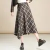 Elegante falda de cuadros para mujer, nuevo estilo otoño e invierno 2026, de cintura alta, falda de línea A adelgazante, falda versátil de dobladillo grande irregular