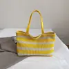 Bolso de Mano Rayado Simple de Primavera 2026 Bolso de Hombro de Gran Capacidad Bolso Tote de Moda Bolso de Playa Hueco para Mujer