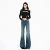 Jeans acampanados vintage lavados y desgastados estilo americano en color naranja para mujer, corte ajustado, adelgazantes, elegantes y versátiles