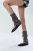 Polainas de tricô com botões estilo retrô para mulheres, versáteis para outono e inverno, com um padrão quente e texturizado e comprimento até a panturrilha.