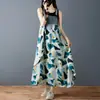 Vestido de tirantes de longitud media de gasa estampada con diseño de mezclilla, holgado, con volantes, estilo nuevo de verano 2026
