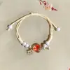Pulseira de Flores Secas Reais de Jingdezhen com Planta Gipsofila e Corda Trançada, Presente para Casais e Melhores Amigos, Modelo Dez Yuan, Fornecimento de Vendedor de Rua