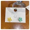 Pendientes Florales Huecos de Color Contrastante Frescos y Sencillos Dulces y Exquisitos Clavos Asimétricos de Plata 2025 Nuevos Accesorios para Orejas