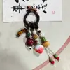 Pingente de Bolsa Original Feito à Mão em Cerâmica de Yuan Xiaohong, Adorno de Borla Tecida com Corda de Jingdezhen, Acessório de Bolsa Artístico de Nicho