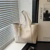 Bolso de Hombro Único Estilo Nuevo Primavera 2026 Casual para Mujer Estilo Coreano Nicho Gran Capacidad Moderno Elegante Personalizado Bolso Tote
