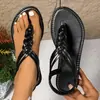 Suministro transfronterizo 2026 nuevo modelo sandalias de chancla para mujer, sandalias tejidas planas de talla grande para mujer, zapatos de moda estilo romano