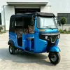 Motocicleta triciclo cubierta a prueba de lluvia para exportación, tuktuk transfronterizo de combustible con potencia suficiente para subir colinas y transportar pasajeros de manera confiable.