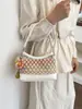 Bolso de axila tejido con paja de arcoíris transfronterizo para mujer, nuevo modelo 2026, bolso de hombro cruzado casual simple de nicho para la playa