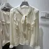 Top de gasa con volantes de alta gama estilo francés para el otoño de 2026, nuevo diseño de otoño, top versátil de manga larga de nicho