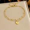 Nueva Tobillera de Cadena para Tobillo de Acero Inoxidable Chapado en Oro de Doble Capa Apilable con Colgante de Corazón de Lujo Ligero y Temperamento, Incrustada con Pedrería