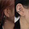 Clip de oreja de alta gama ins a la moda todo partido con borla de perlas diseño de nicho femenino personalidad clip de hueso de oreja sin perforación de lujo ligero femenino