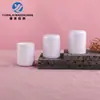 En stock tapa redonda recta de 29 dientes tapa de plástico para botella de cuidado de la piel set de cúpula de sellado a prueba de fugas tapa de doble capa para botella material de embalaje