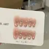 Manicura vestible hecha completamente a mano hace un debut deslumbrante: manicura hecha a mano estilo ojo de gato, uñas postizas hechas a mano color rosa nude transparente con circonita