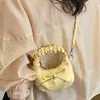 Bolso de Mano Plegado con Lazo Estilo Coreano de Nicho para Mujer Primavera 2026, Nuevo Bolso de Hombro Chic de Moda para el Trabajo