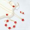 CDD set de cinco piezas de doble cara con flor de ciruelo nueva, collar de trébol de cuatro hojas, aretes, pulsera, anillo, traje de aretes, suministro para comercio exterior