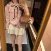 Elegante y chic cárdigan de punto estilo francés con ribete de encaje, con un diseño juvenil, lazo en forma de corazón y detalles de amarre para mujer